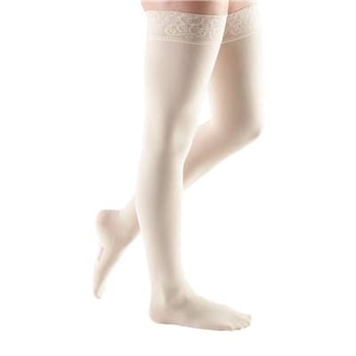Mediven Comfort Thigh High 15-20mmHg Compression Stocking with Lace Silicone Top Band Standard, Closed Toe, Wheat, SIze V - Pair - Image 1