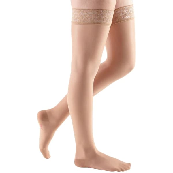 Mediven Sheer & Soft Thigh High 20-30mmHg Compression Stocking with Lace Top Band Standard, Closed Toe, Toffee, Size IV - Pair - Image 1