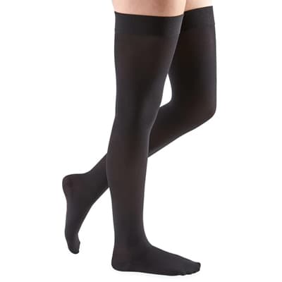 Mediven Comfort Thigh High 20-30mmHg Compression Stocking with Silicone Beaded Top Band Standard, Closed Toe, Ebony, SIze V - Pair - Image 1
