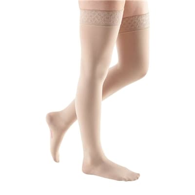 Mediven Comfort Thigh High 30-40mmHg Compression Stocking with Lace Silicone Top Band Standard, Closed Toe, Sandstone, SIze V - Pair - Image 1